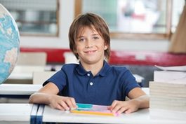 Picture of a young boy in a Kids First Classroom