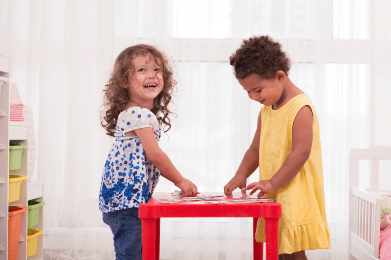 Children resolving a conflict with child psychologist support in Brookvale