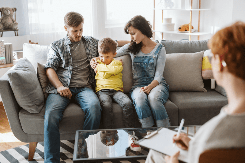 Parent and child participating in a therapy session together in Northern Beaches, Sydney, reflecting the importance of family involvement in therapy.