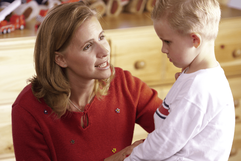 Mother and child discussing bullying at home in Northern Beaches, Sydney, showing supportive communication.