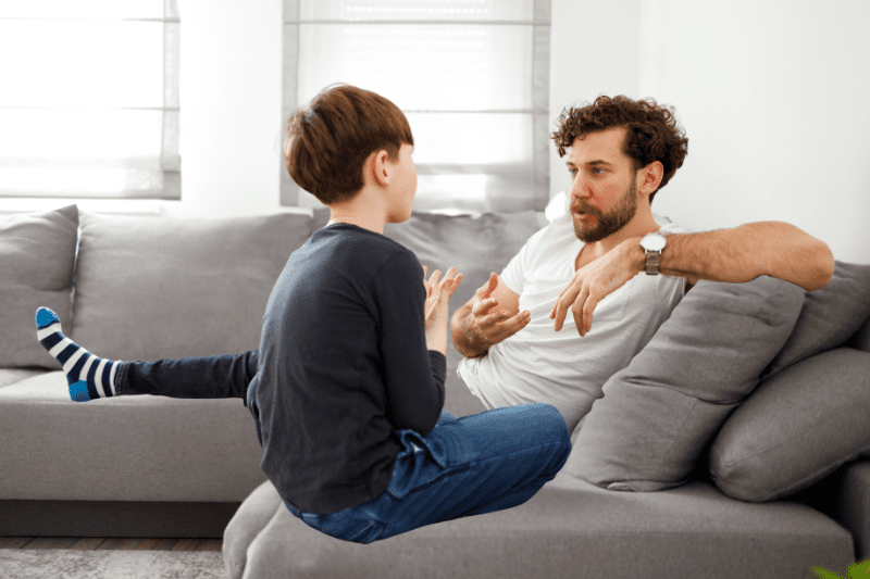 Parent teaching their child about setting boundaries in friendships at home in Northern Beaches, Sydney.