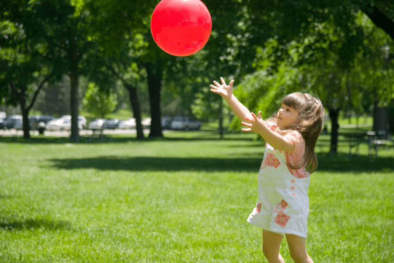 By the age of 5, your child should know how to catch a ball