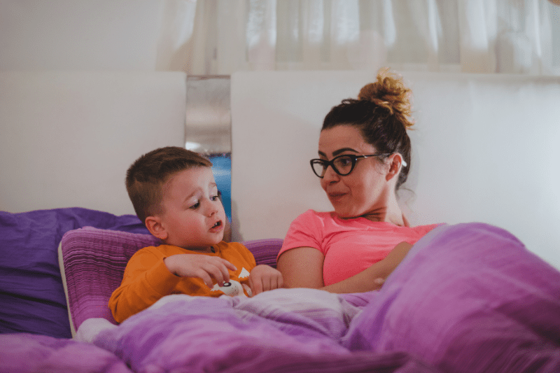 Parent listening attentively to their child.