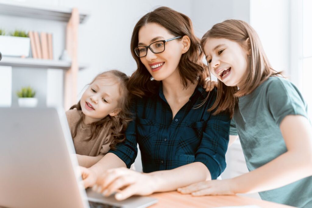 Parent typing a clear and focused email to a teacher during Term 4 in Sydney Northern Beaches.