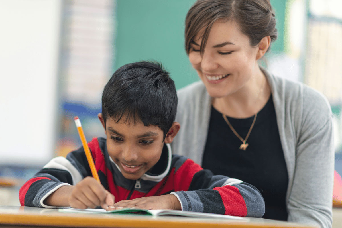 Children learning to read and spell with the Sounds-Write Literacy Program at Kids First Children's Services.