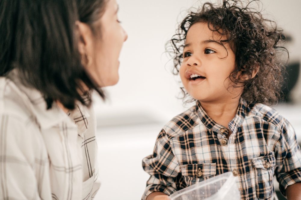 Language Development Issues, Parent and child engaging in speech therapy activities after COVID impacts, supported by Kids First Children's Services in Sydney.