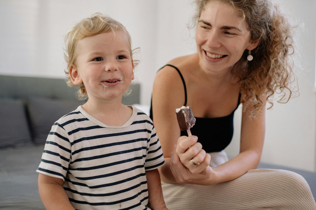 An autistic child with his mother at Kids First Children’s Services in Brookvale, representing the real-world impact of the Thriving Kids and No Child Left Behind policy discussions on children, families, and access to local multidisciplinary support.