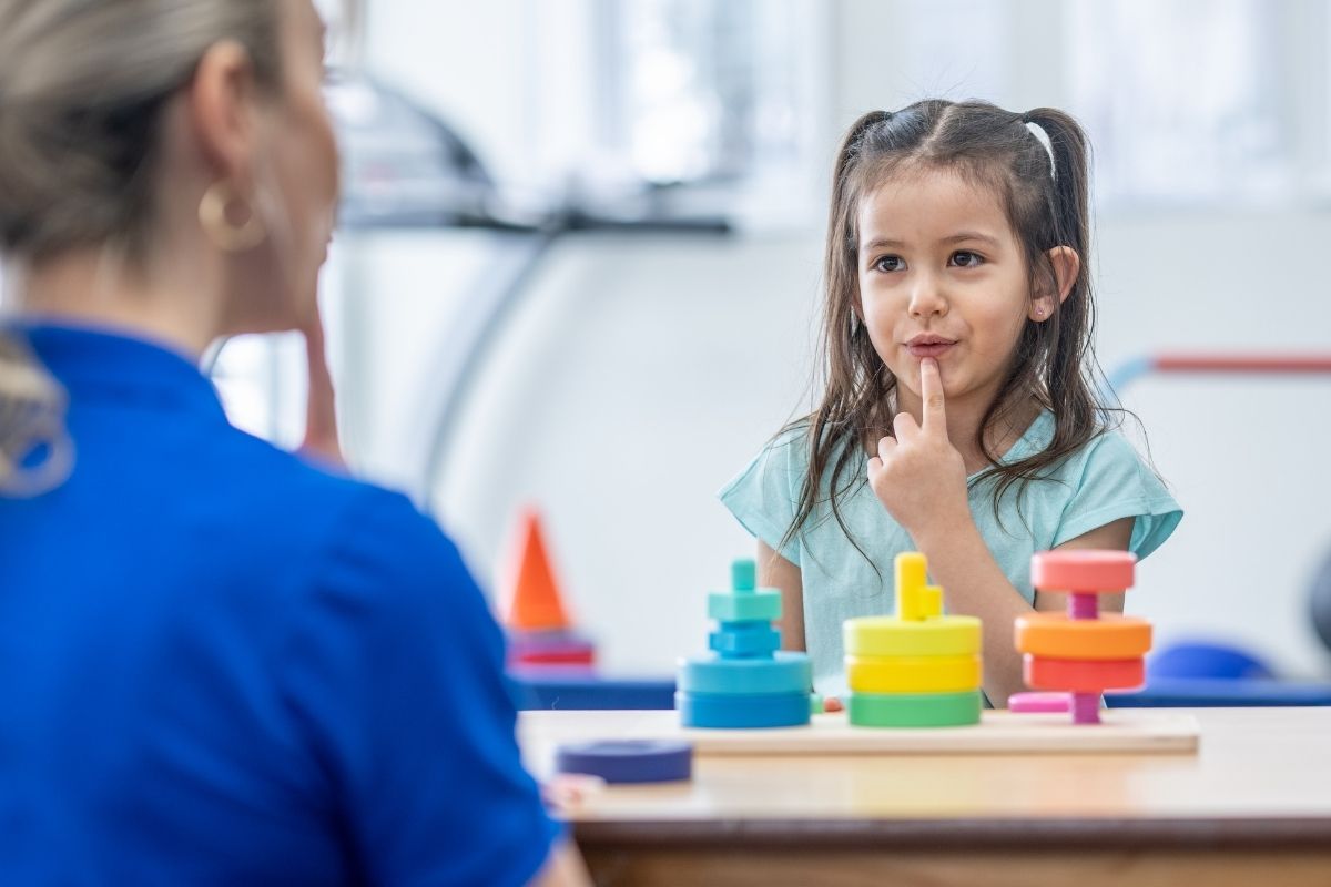 Young child completing a speech assessment with a speech pathologist at Kids First Children’s Services in Brookvale, where eligible children can access Medicare rebates for speech therapy.